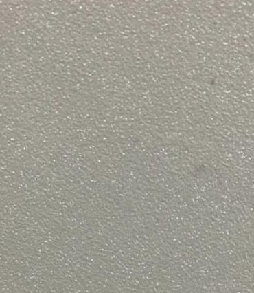 A close-up of a Grey PSL 1014 with a Texture finish PVC Laminate available at Material Depot in Bangalore