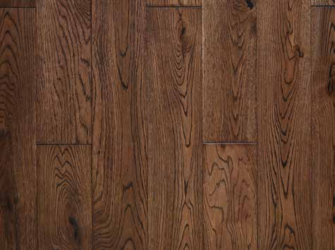 A close-up of aOak Caramel 125x400-1200 mm Solid Wood Floor - 18 mm (Random Sizes) available at Material Depot in Bangalore