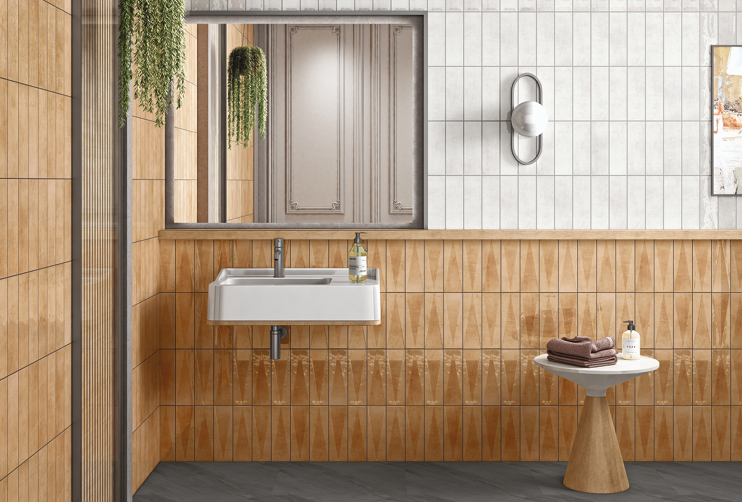 A close-up of a Subway Wall Tile TL 06164 H Solara Soft Dune Base 9 x 3 inch Ceramic Glossy Finish - 10 mm | 25 Random Design | Suitable for Accent / Feature Walls, Bathroom, Kitchen Wall & Backsplashes with a Glossy finish available at Material Depot in Bangalore