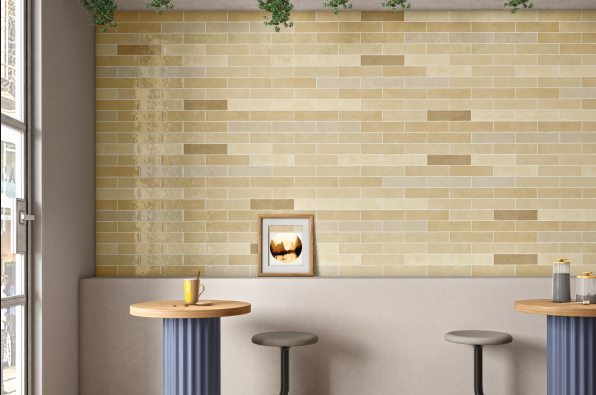 A close-up of a Subway Wall Tile TL 06161 D Eclat Blanc Lustrous Latte 12 x 3 inch Ceramic Glossy Finish - 10 mm | 48 Random Design | Suitable for Accent / Feature Walls, Bathroom, Kitchen Wall & Backsplashes with a Glossy finish available at Material Depot in Bangalore