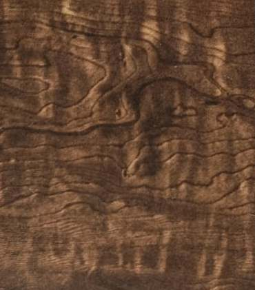 A close-up of a Wenge 5011 SF Canyon Apple with a Suede finish Decorative Laminate available at Material Depot in Bangalore