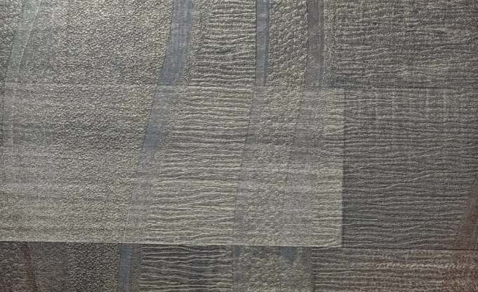 A close-up of a Wenge 5042 OW Raman Silvia Dark with a Texture finish Decorative Laminate available at Material Depot in Bangalore