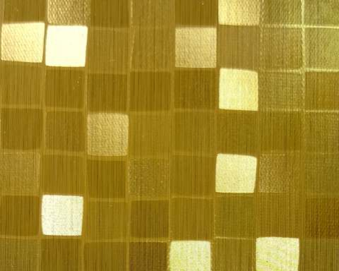 A close-up of a Gold 9006 FL with a Texture finish PVC Laminate available at Material Depot in Bangalore