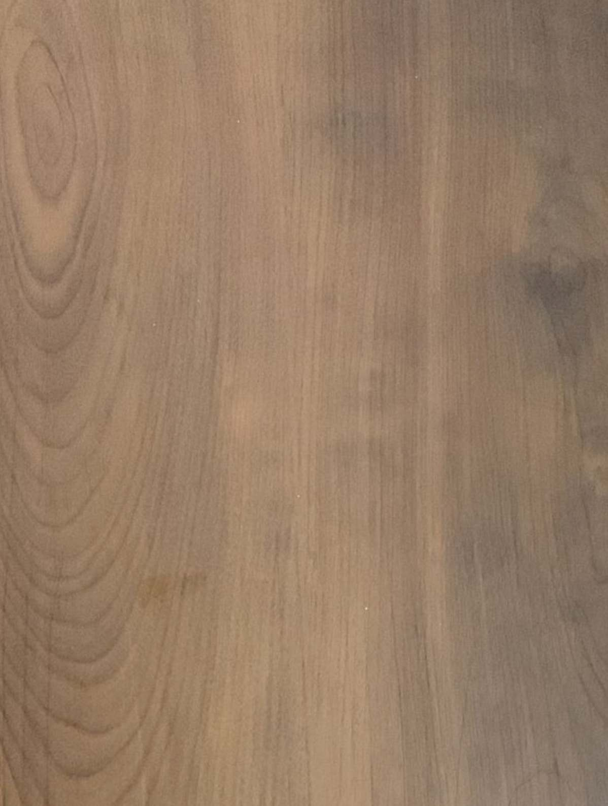 A close-up of a Brown CA 1138 Zembezi Walnut with a Texture finish Decorative Laminate available at Material Depot in Bangalore