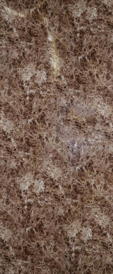 A close-up of a Brown Fonce Imperial with a Glossy finish Decorative Laminate available at Material Depot in Bangalore