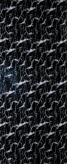 A close-up of a Black Lavadia Black Marble with a Glossy finish Decorative Laminate available at Material Depot in Bangalore