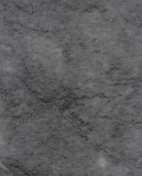 A close-up of a Grey 2076 TM Grey Granite with a High Gloss finish Acrylic Laminate available at Material Depot in Bangalore