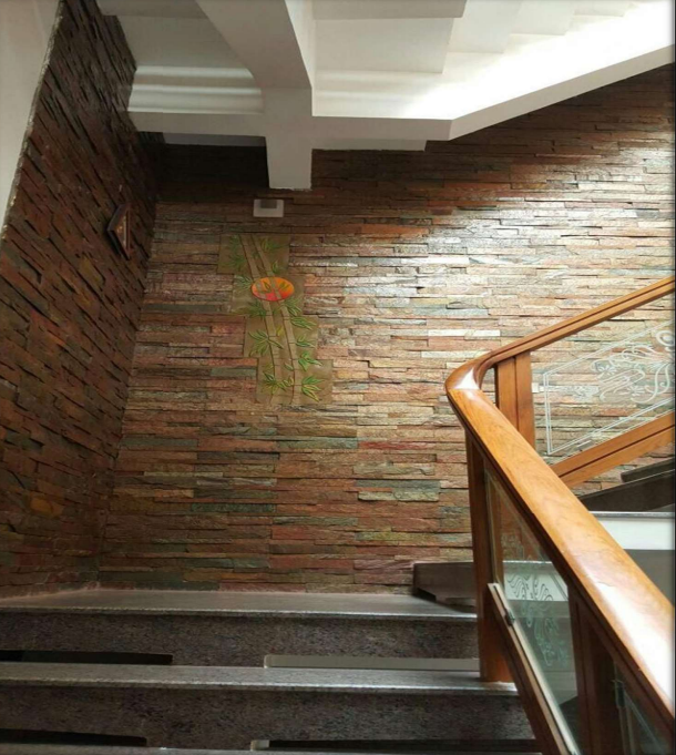 A close-up of a 1031 Copper Stone 609.6x152.4 mm Wall Cladding available at Material Depot in Bangalore