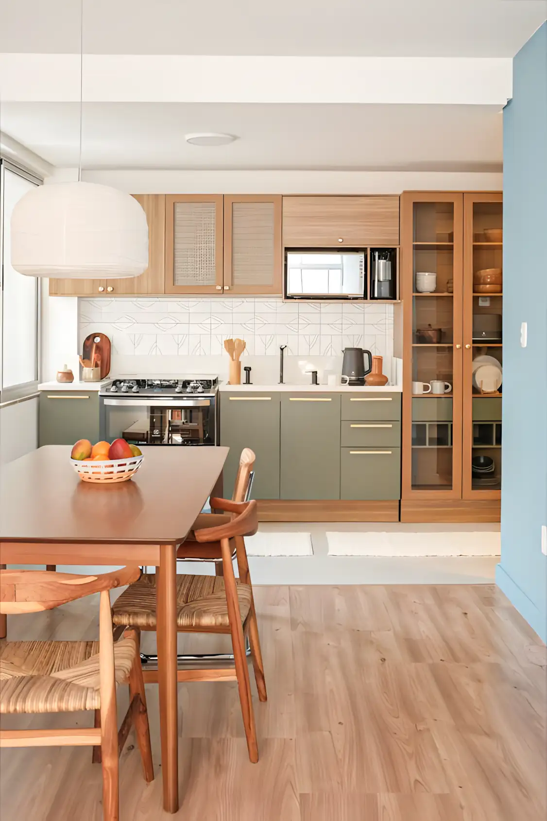 Cozy Dining and Kitchen Space with Green Accents