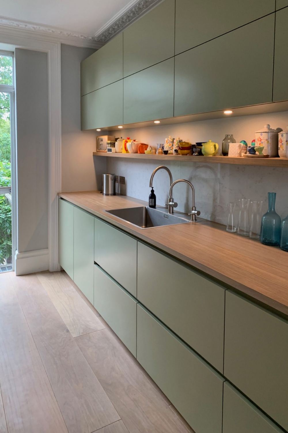 Green Scandinavian kitchen with open shelving | Material Depot