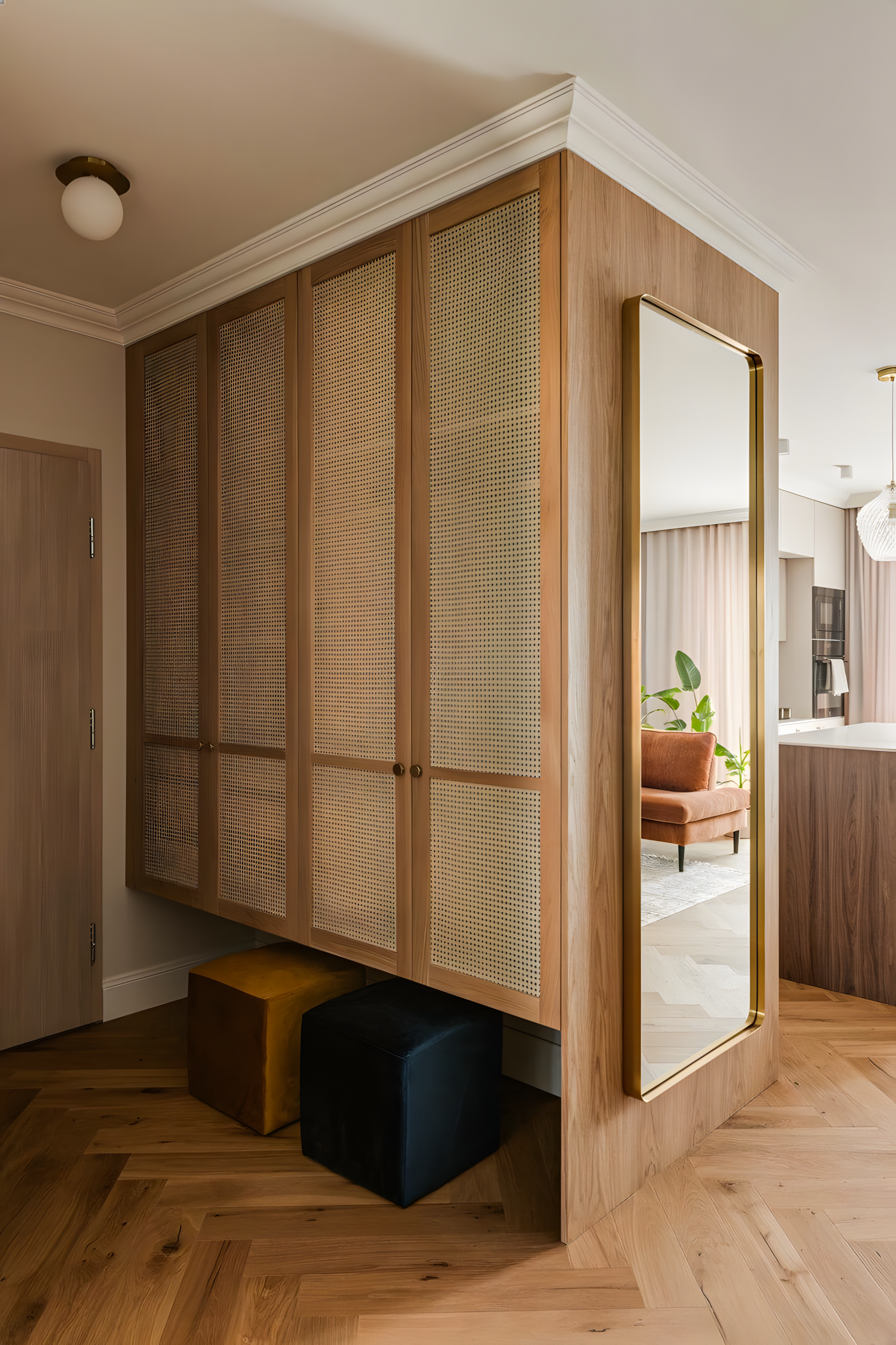 Modern Entryway with Rattan-Paneled Wardrobe and Full-Length Mirror | Material Depot