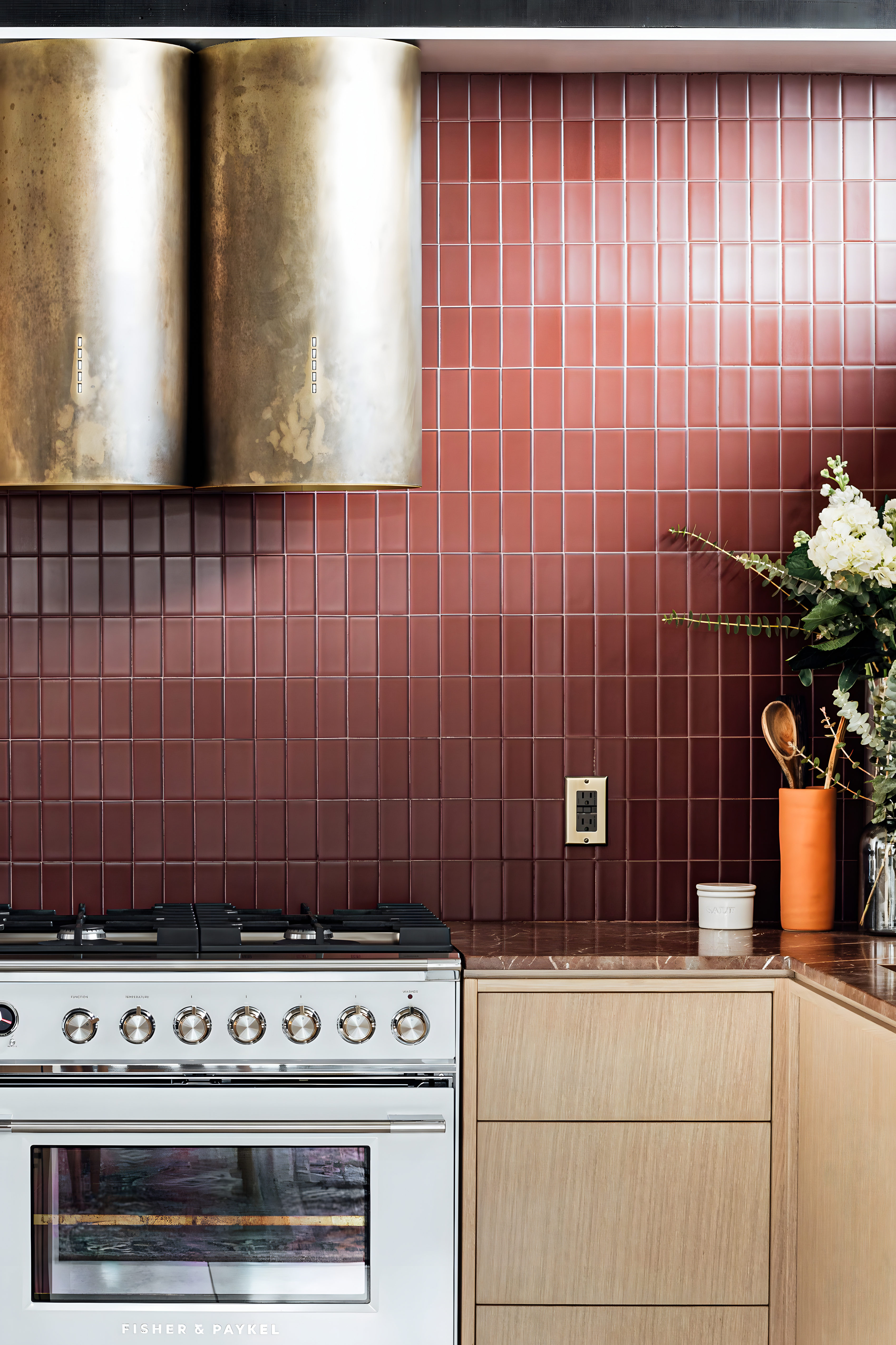 Modern Kitchen with Red Brick Backsplash and Brass Hood | Material Depot