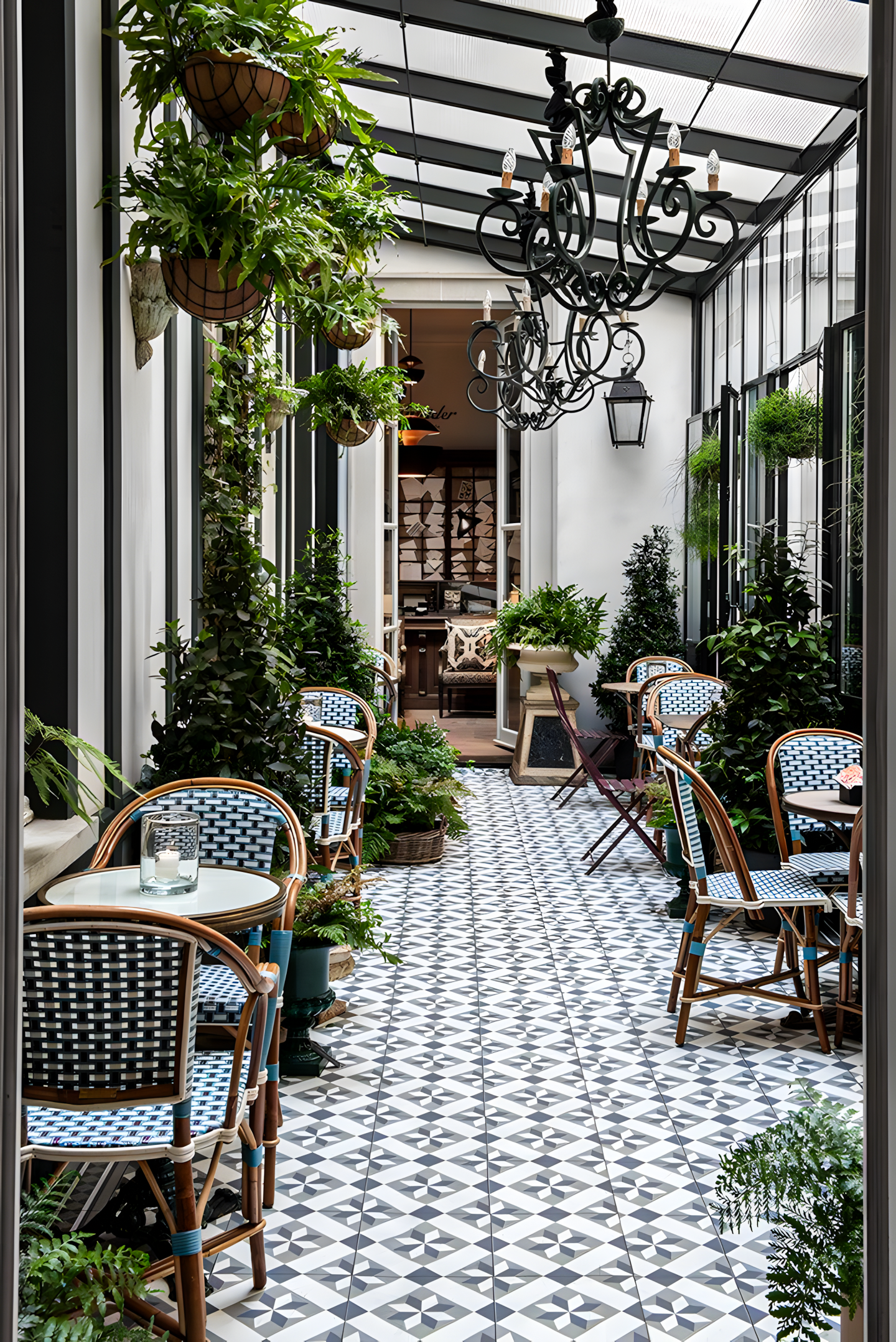 Parisian-Inspired Patio with Patterned Tiles and Greenery | Material Depot