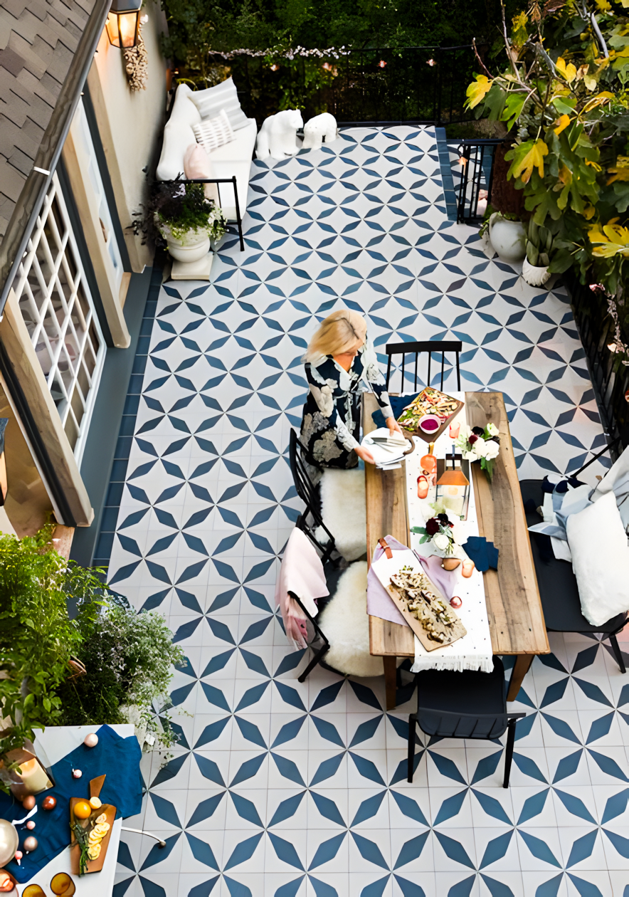 Stylish Patio with Patterned Tiles and Outdoor Dining Area | Material Depot